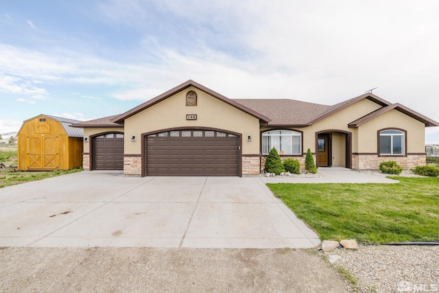 748 Thistle Dr, Spring Creek, NV 89815 - view of front of property with stucco siding, stone siding, a garage, and driveway