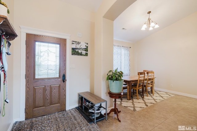 748 Thistle Dr, Spring Creek, NV 89815 - tiled entryway with a chandelier, plenty of natural light, and baseboards