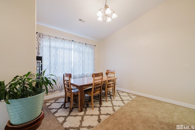 748 Thistle Dr, Spring Creek, NV 89815 - tiled dining space featuring a chandelier, lofted ceiling, and baseboards