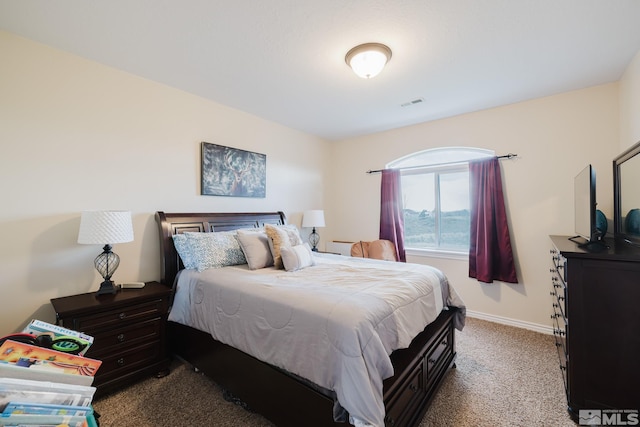 748 Thistle Dr, Spring Creek, NV 89815 - carpeted bedroom featuring baseboards