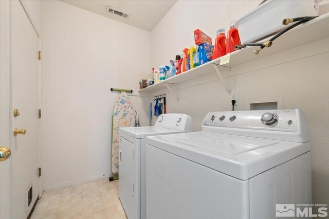 10010 Purple Sage Dr, Reno, NV 89506 - washroom with washing machine and dryer and baseboards