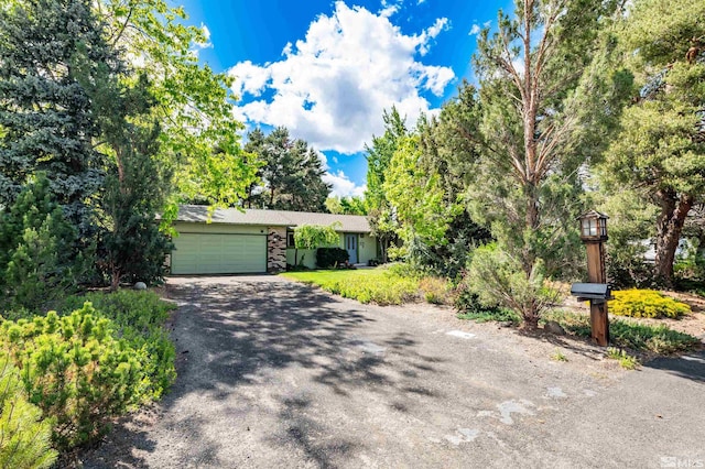 12565 Creek Crest Dr, Reno, NV 89511 - view of front of property featuring a garage and driveway