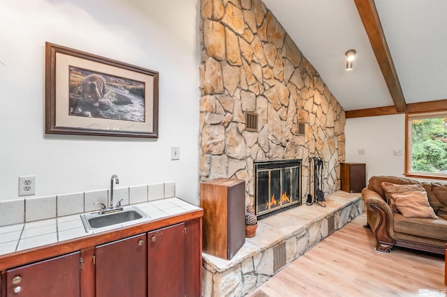 12565 Creek Crest Dr, Reno, NV 89511 - living area with light wood-type flooring and a fireplace