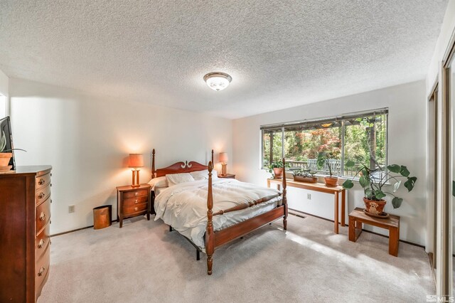 12565 Creek Crest Dr, Reno, NV 89511 - bedroom featuring light carpet and a textured ceiling
