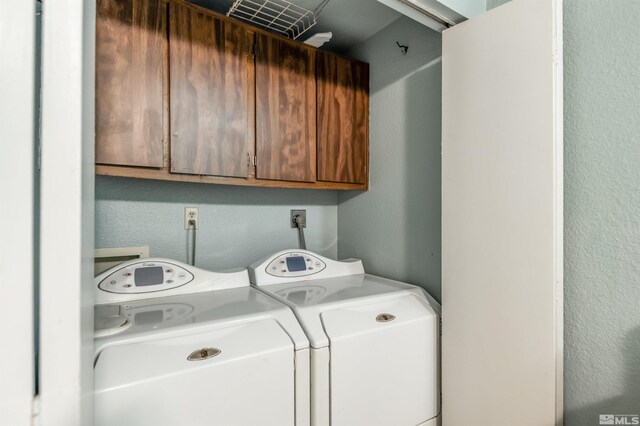 12565 Creek Crest Dr, Reno, NV 89511 - laundry area featuring cabinet space, washing machine and dryer, and a textured wall
