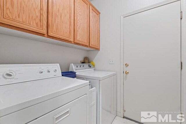 5979 Hidden Highlands Dr, Reno, NV 89502 - washroom featuring washer and dryer and cabinet space