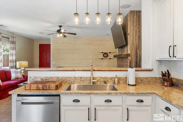 9185 Raytheon Ct, Reno, NV 89506 - kitchen featuring dishwasher, a sink, ceiling fan, white cabinets, and hanging light fixtures