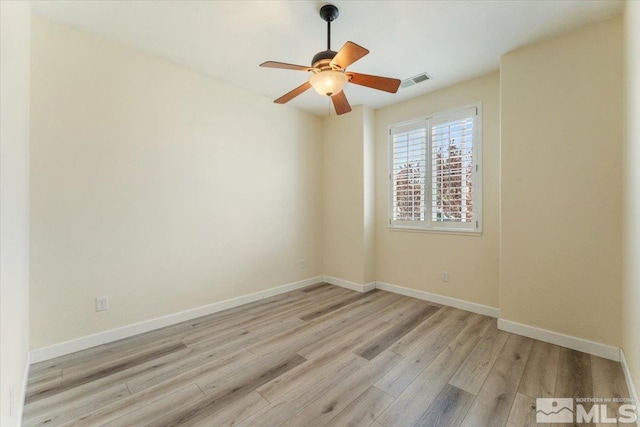 9185 Raytheon Ct, Reno, NV 89506 - empty room featuring wood finished floors, baseboards, and ceiling fan