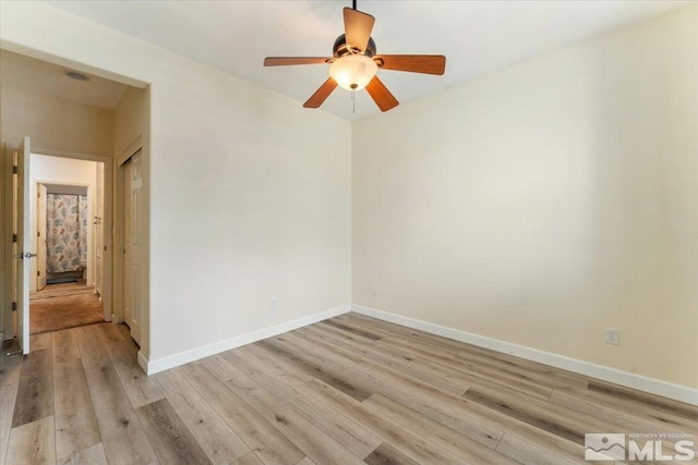 9185 Raytheon Ct, Reno, NV 89506 - empty room featuring light wood-type flooring, baseboards, and a ceiling fan