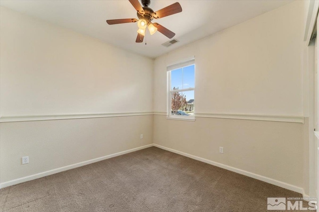 9185 Raytheon Ct, Reno, NV 89506 - carpeted spare room with baseboards and a ceiling fan
