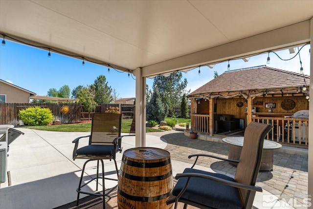 9185 Raytheon Ct, Reno, NV 89506 - view of patio featuring a fenced backyard and a gazebo