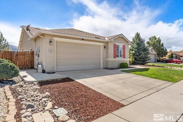 9185 Raytheon Ct, Reno, NV 89506 - ranch-style house featuring fence, driveway, a garage, and stucco siding