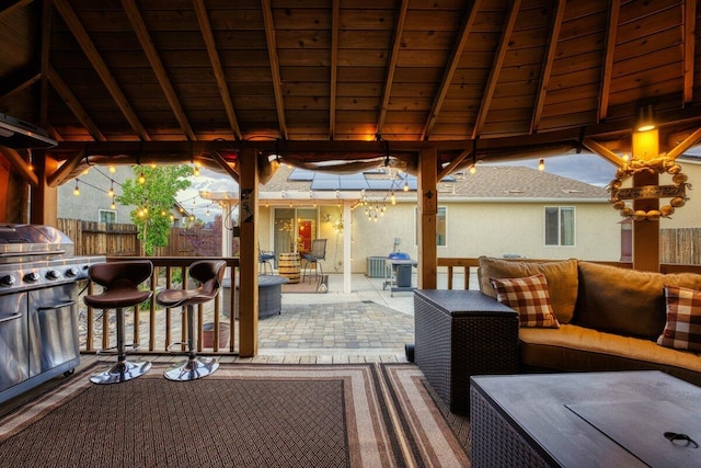 9185 Raytheon Ct, Reno, NV 89506 - view of patio featuring outdoor lounge area, fence, and cooling unit