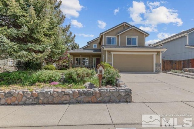 5284 Tappan Ct, Reno, NV 89523 - craftsman-style house featuring driveway, an attached garage, and stone siding