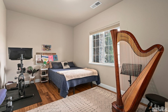 9825 Hayfield Dr, Sparks, NV 89441 - bedroom featuring wood finished floors and baseboards