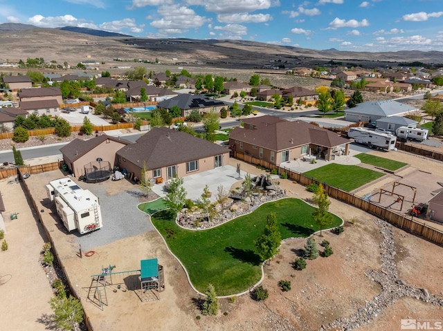 9825 Hayfield Dr, Sparks, NV 89441 - aerial perspective of suburban area with a mountain backdrop