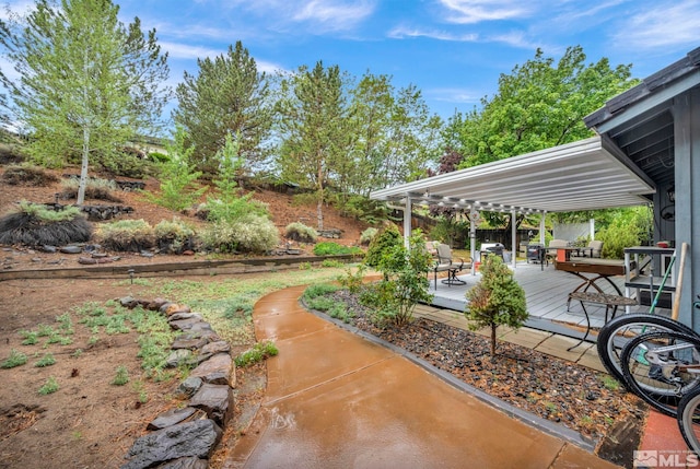 5190 Orinda Dr, Sparks, NV 89436 - view of yard featuring a deck