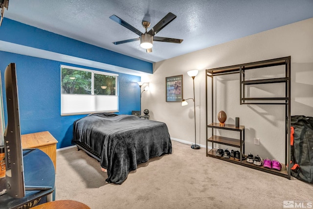 5190 Orinda Dr, Sparks, NV 89436 - bedroom featuring carpet flooring, baseboards, a textured ceiling, and a ceiling fan