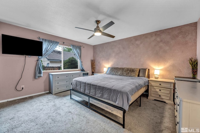 5190 Orinda Dr, Sparks, NV 89436 - bedroom featuring light carpet, baseboards, and a ceiling fan