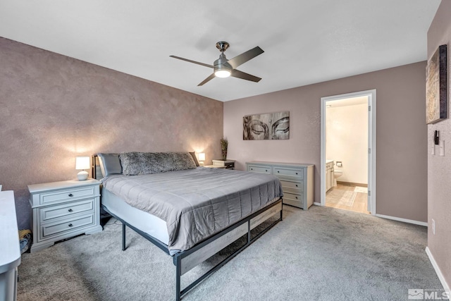 5190 Orinda Dr, Sparks, NV 89436 - bedroom with light carpet, ceiling fan, ensuite bathroom, a textured wall, and baseboards
