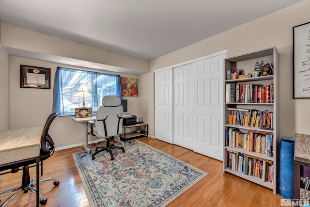 5190 Orinda Dr, Sparks, NV 89436 - home office with wood finished floors and baseboards
