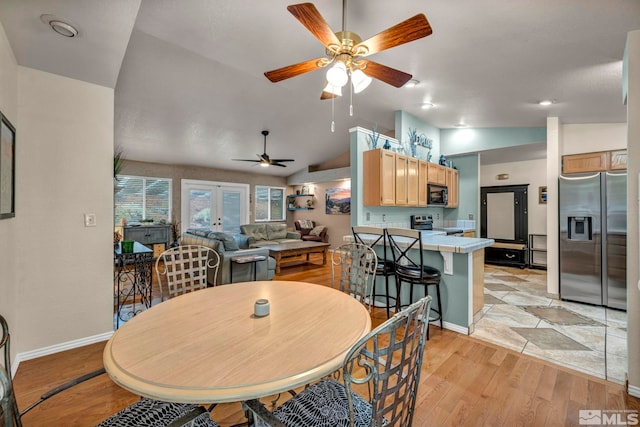 5190 Orinda Dr, Sparks, NV 89436 - dining space featuring ceiling fan, light wood finished floors, lofted ceiling, french doors, and baseboards