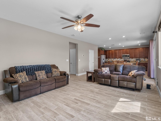 2401 Bridgetown Loop, Sparks, NV 89436 - living area with baseboards, a ceiling fan, recessed lighting, and light wood-style flooring