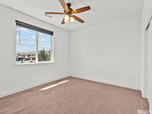 2401 Bridgetown Loop, Sparks, NV 89436 - spare room featuring carpet floors, ceiling fan, and baseboards