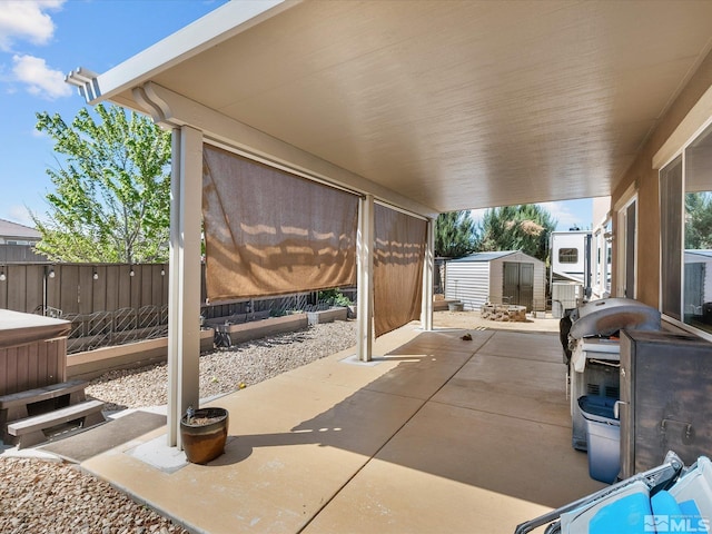 2401 Bridgetown Loop, Sparks, NV 89436 - view of patio with a storage shed, an outdoor structure, and a fenced backyard