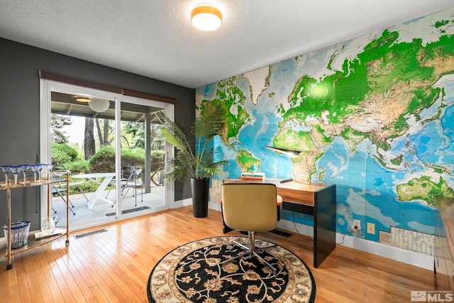 2135 Skyline Blvd, Reno, NV 89509 - office space featuring wood-type flooring, baseboards, and a textured ceiling