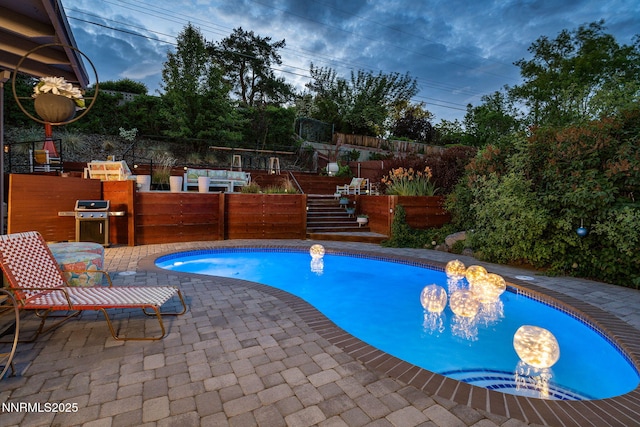 2135 Skyline Blvd, Reno, NV 89509 - view of swimming pool with a grill, a patio area, and a garden