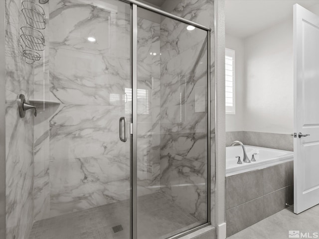 213 Enclave Key Ct, Reno, NV 89506 - bathroom featuring a bath and a marble finish shower
