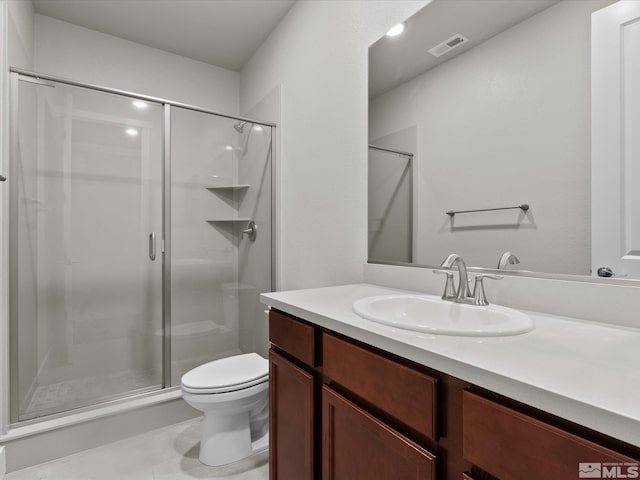 213 Enclave Key Ct, Reno, NV 89506 - bathroom featuring a stall shower, toilet, and vanity