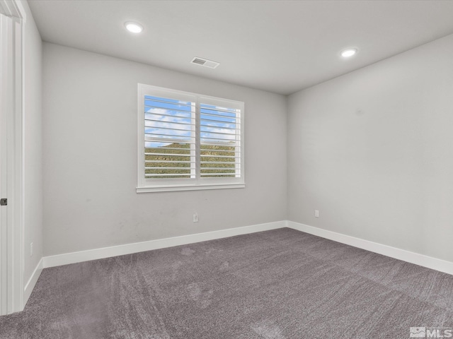 213 Enclave Key Ct, Reno, NV 89506 - spare room with dark carpet, baseboards, and recessed lighting