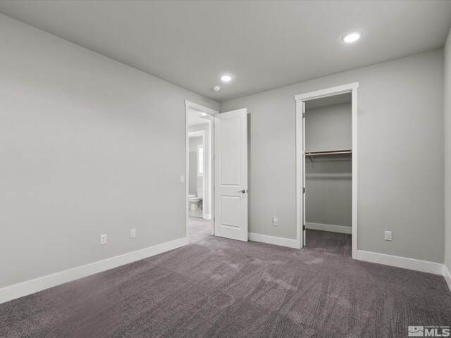 213 Enclave Key Ct, Reno, NV 89506 - unfurnished bedroom featuring recessed lighting, carpet flooring, baseboards, and a spacious closet