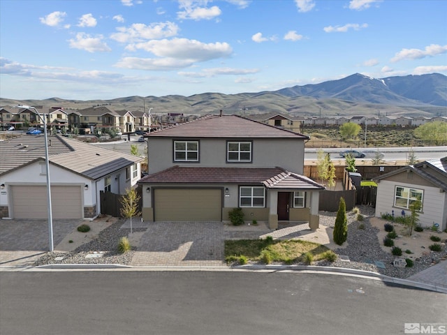213 Enclave Key Ct, Reno, NV 89506 - traditional-style house with a residential view, fence, stucco siding, and a mountain view