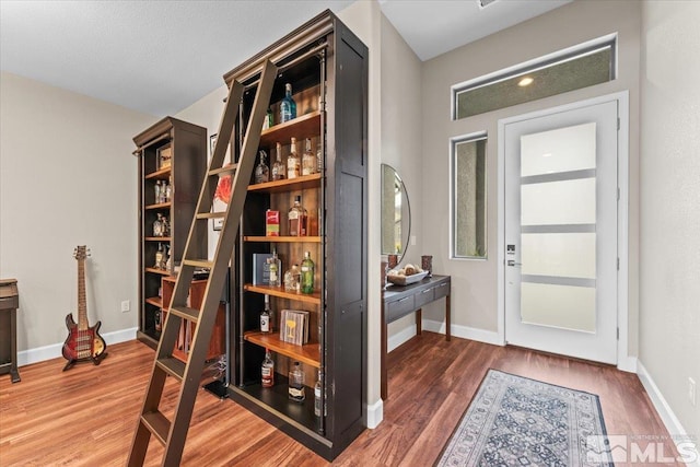 11129 Bandero Heights Ln, Reno, NV 89521 - entrance foyer featuring wood finished floors and baseboards