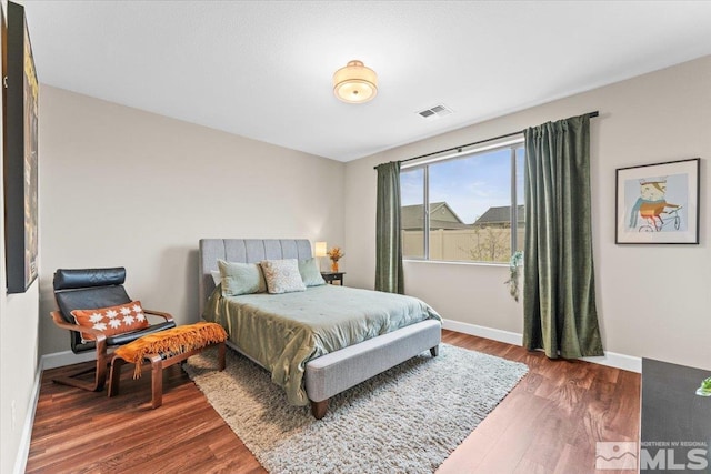 11129 Bandero Heights Ln, Reno, NV 89521 - bedroom featuring wood finished floors and baseboards