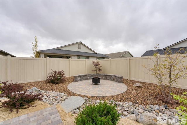 11129 Bandero Heights Ln, Reno, NV 89521 - fenced backyard with a patio area and a fire pit
