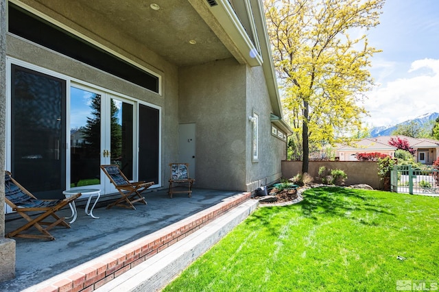 971 Fieldgate Way, Gardnerville, NV 89460 - view of yard featuring a mountain view, a patio, and french doors