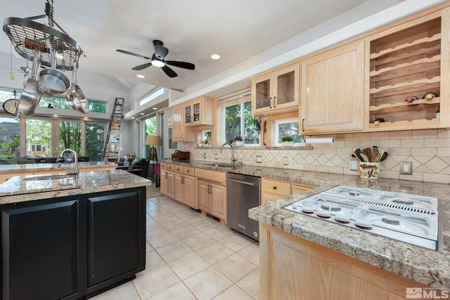 971 Fieldgate Way, Gardnerville, NV 89460 - kitchen featuring a sink, light brown cabinetry, stovetop with downdraft, stainless steel dishwasher, and lofted ceiling