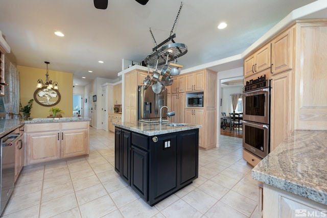 971 Fieldgate Way, Gardnerville, NV 89460 - kitchen featuring light brown cabinetry, stainless steel appliances, a chandelier, light tile patterned floors, and recessed lighting