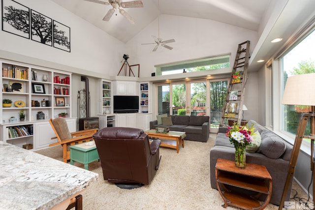 971 Fieldgate Way, Gardnerville, NV 89460 - carpeted living room featuring a ceiling fan, plenty of natural light, and high vaulted ceiling