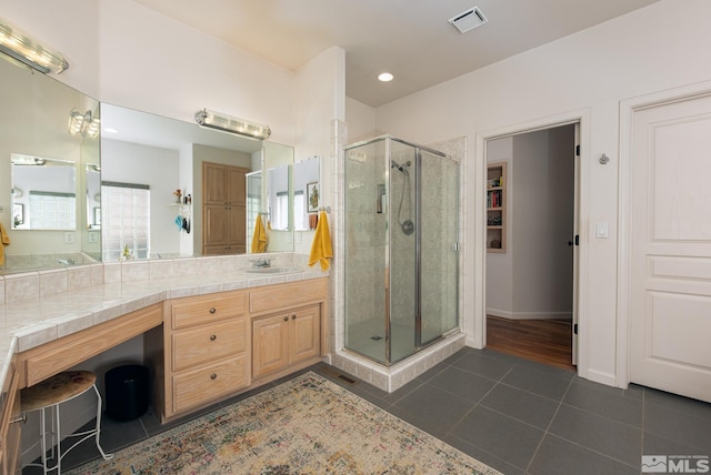 971 Fieldgate Way, Gardnerville, NV 89460 - full bathroom with a stall shower, tile patterned floors, vanity, baseboards, and recessed lighting