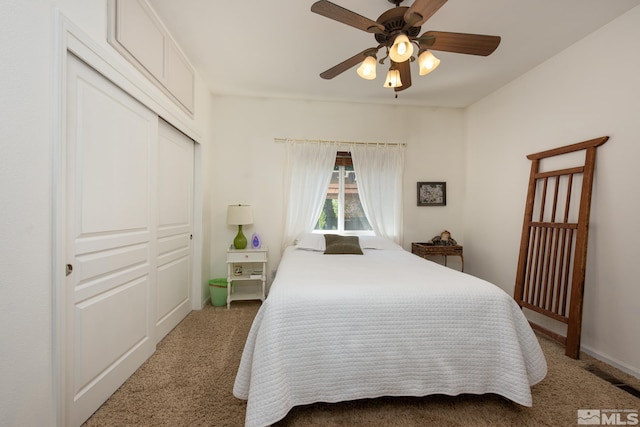 971 Fieldgate Way, Gardnerville, NV 89460 - bedroom with light colored carpet, a closet, and ceiling fan
