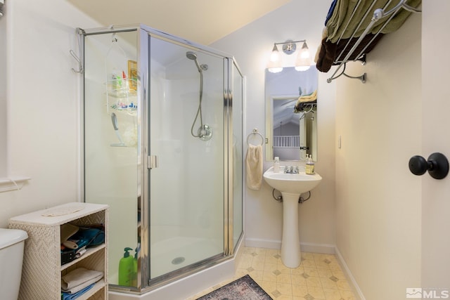971 Fieldgate Way, Gardnerville, NV 89460 - full bath featuring a stall shower, baseboards, and a sink