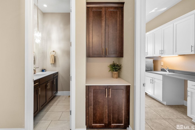 1009 Tremolite, Reno, NV 89511 - bathroom featuring tile patterned floors, vanity, recessed lighting, and baseboards