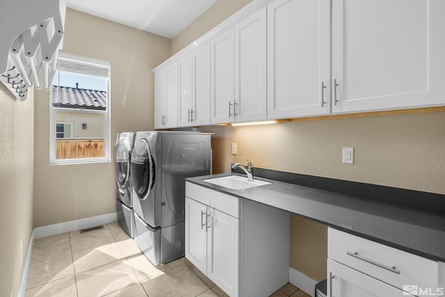 1009 Tremolite, Reno, NV 89511 - clothes washing area with cabinet space, independent washer and dryer, baseboards, and light tile patterned floors