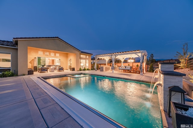 1009 Tremolite, Reno, NV 89511 - view of swimming pool with a pergola, a pool with connected hot tub, a patio area, and exterior kitchen