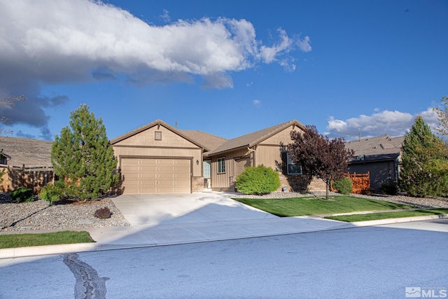 6680 Voyage Dr, Sparks, NV 89436 - ranch-style home with an attached garage, concrete driveway, and board and batten siding